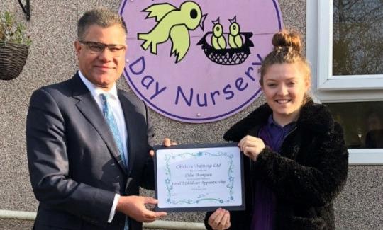 Alok Sharma MP and Chloe Thompson, collecting her Level 2 CYPW certificate.